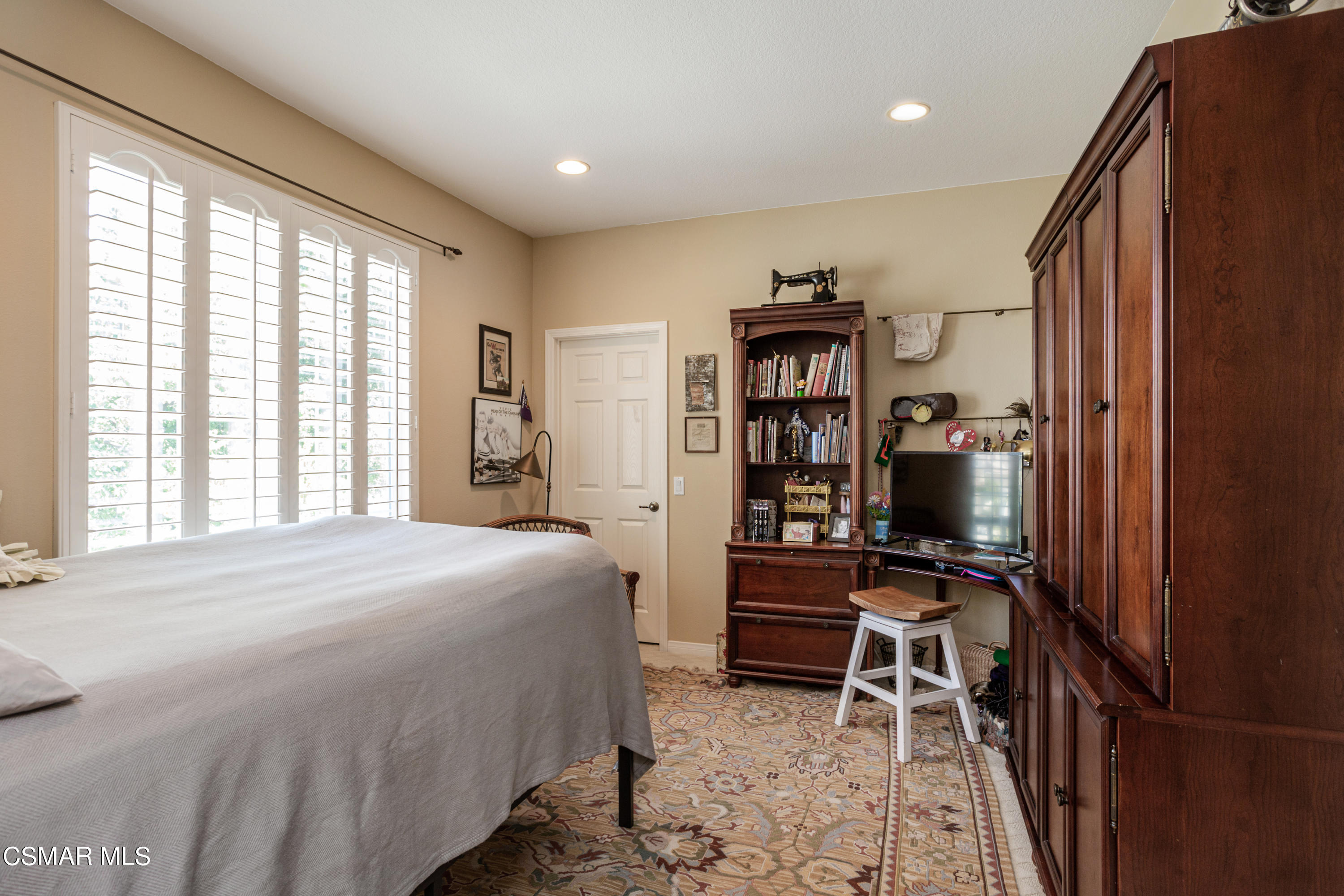 30 West Twisted Oak Drive Simi Valley, CA 93065 - Photo 28 of 45 a bedroom with a bed furniture and a window