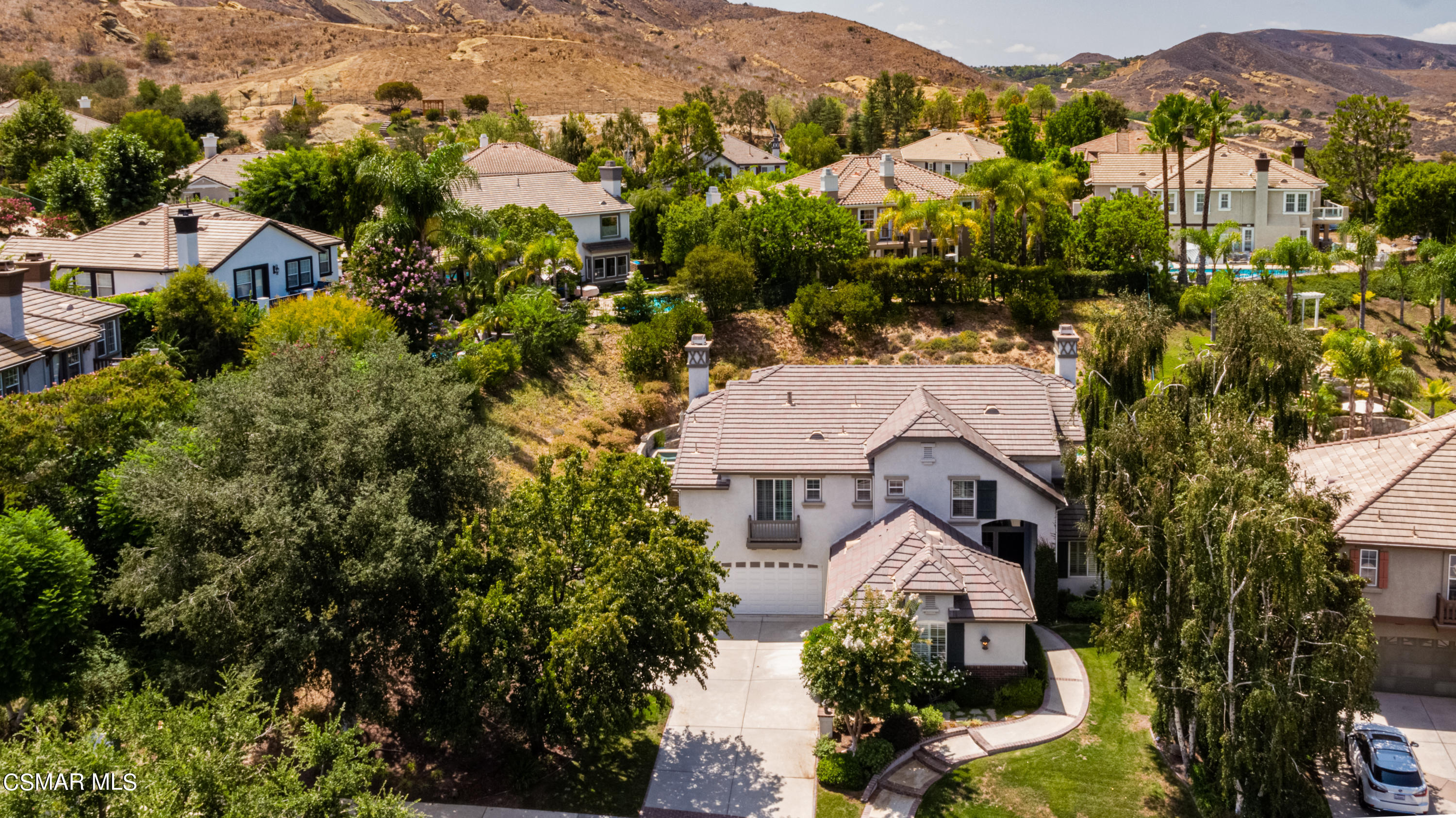 30 West Twisted Oak Drive Simi Valley, CA 93065 - Photo 4 of 45 an aerial view of residential houses with outdoor space and trees