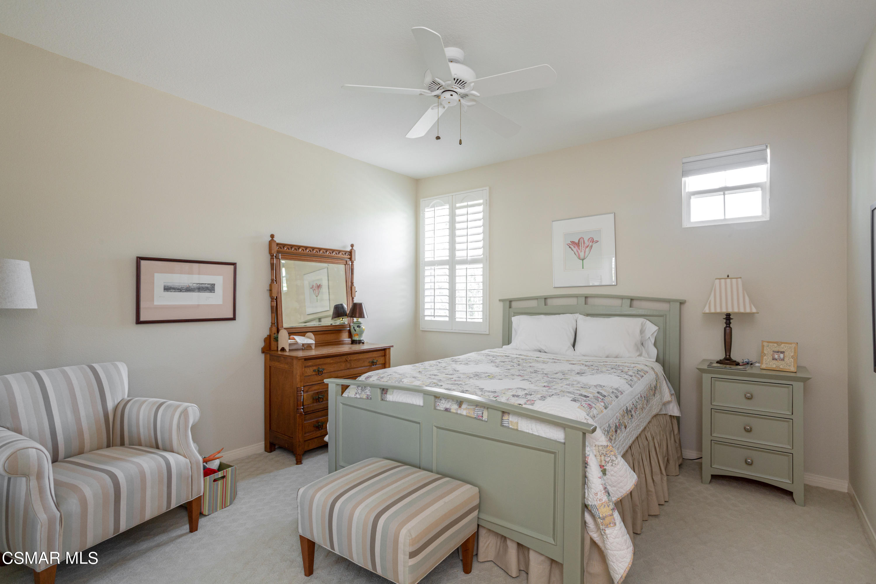 30 West Twisted Oak Drive Simi Valley, CA 93065 - Photo 31 of 45 a bedroom with a bed and a couch