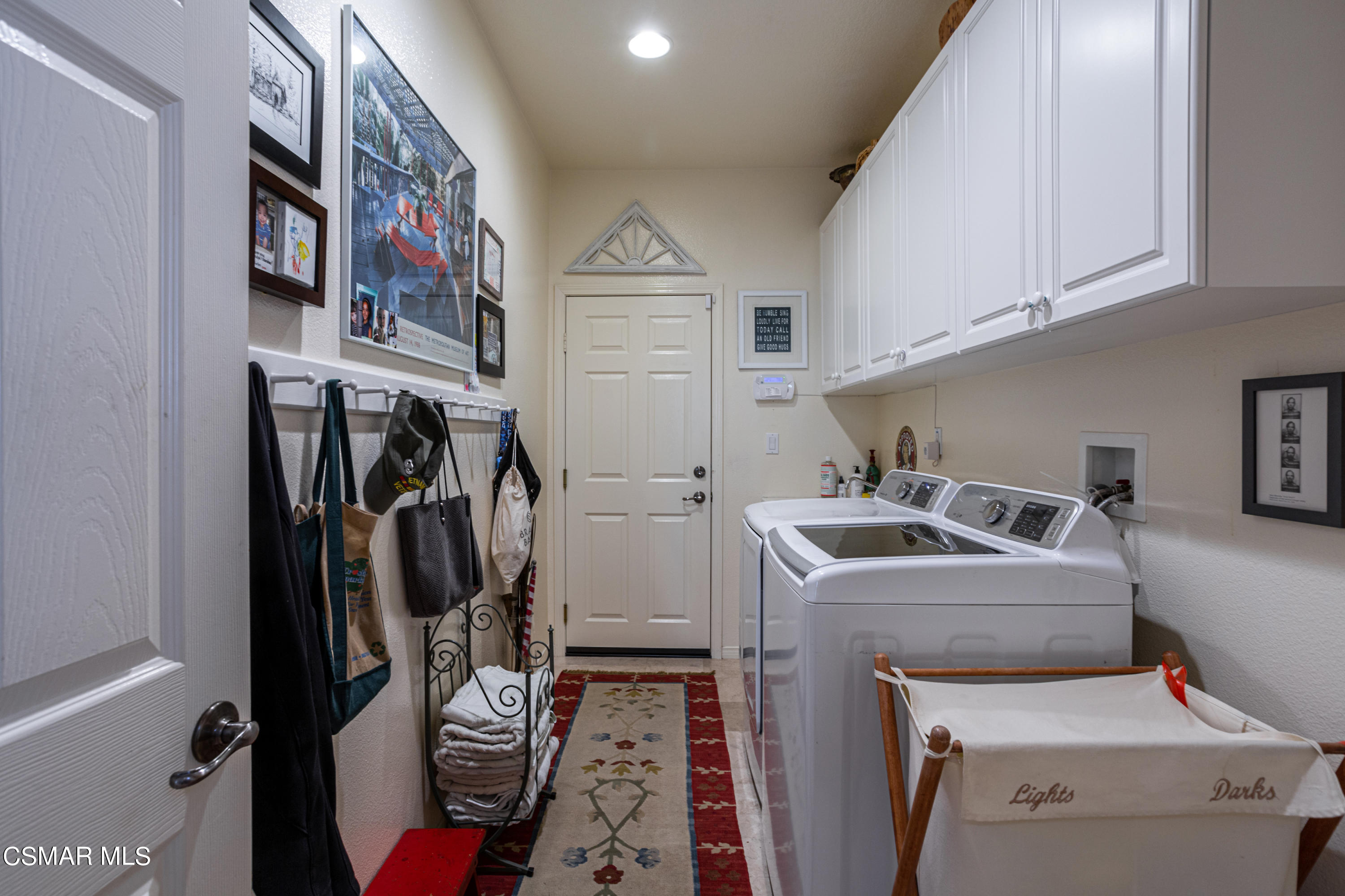 30 West Twisted Oak Drive Simi Valley, CA 93065 - Photo 32 of 45 a utility room with dryer and washer