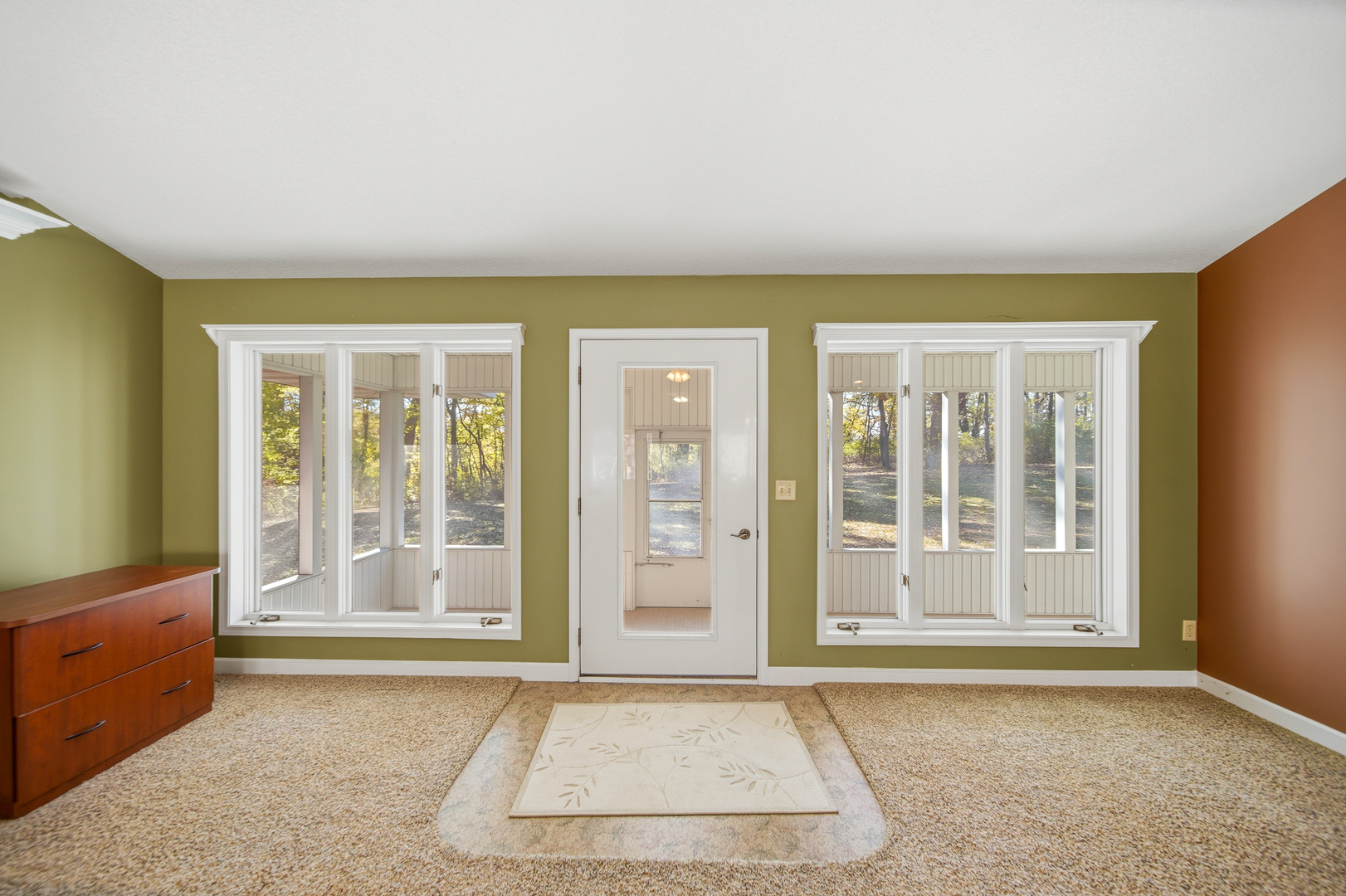 15207 Henry Road Morrison, IL 61270 - Photo 11 of 46 a view of an empty room with glass door