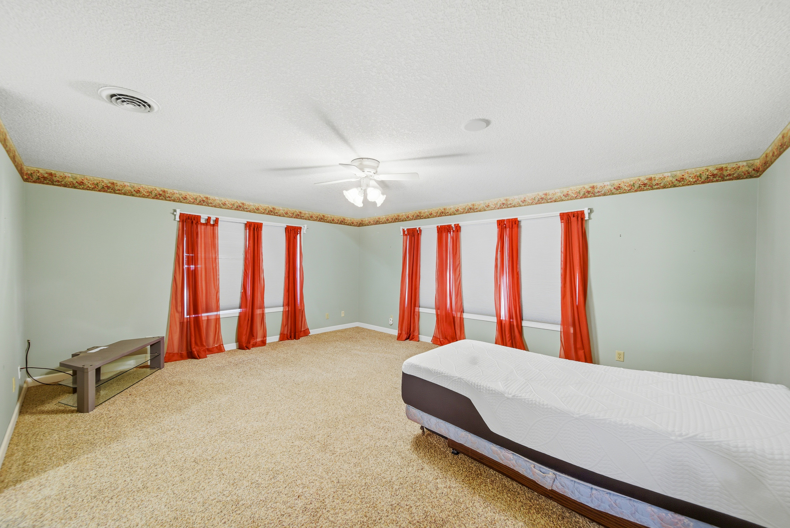 15207 Henry Road Morrison, IL 61270 - Photo 15 of 46 a bed sitting in a room next to a window