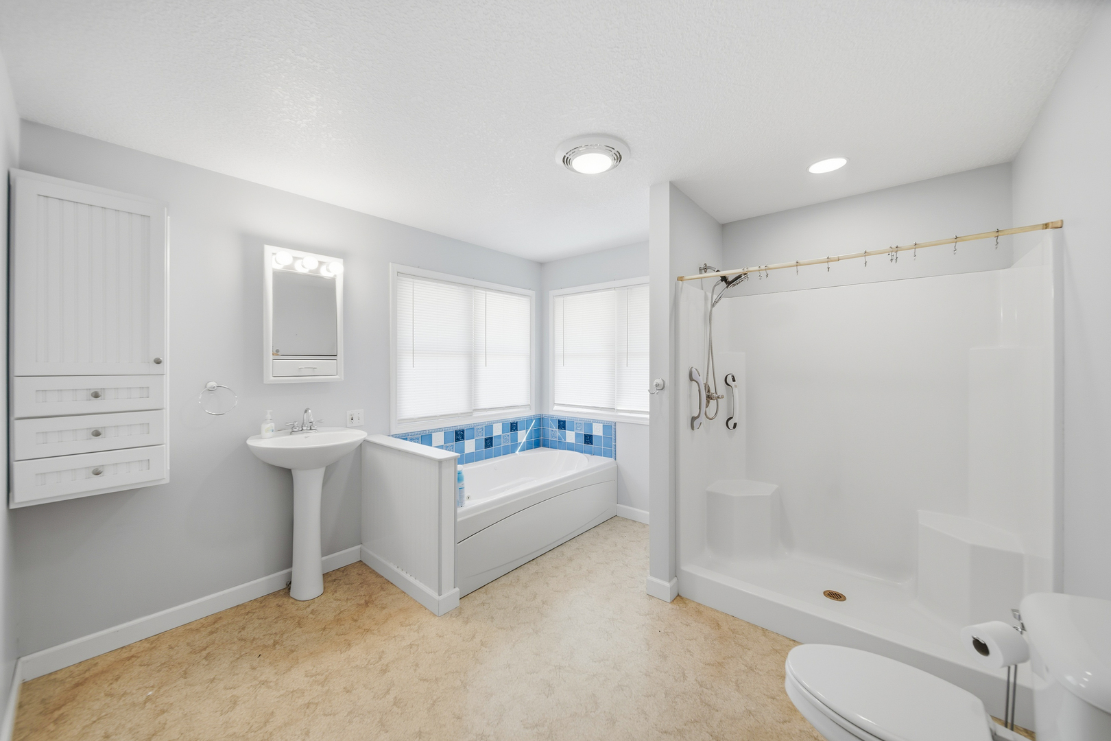 15207 Henry Road Morrison, IL 61270 - Photo 18 of 46 a bathroom with a sink toilet and shower