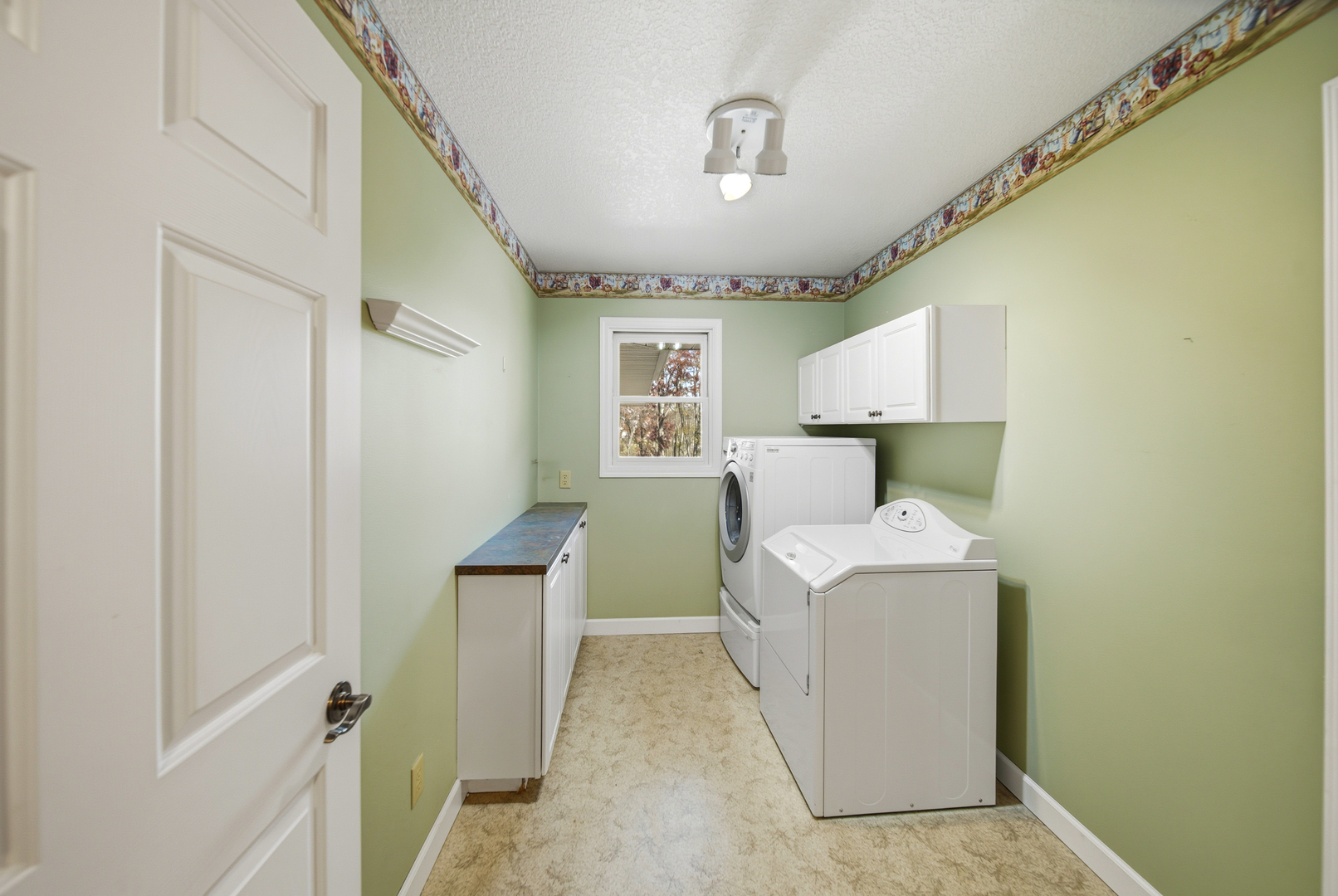 15207 Henry Road Morrison, IL 61270 - Photo 19 of 46 a utility room with dryer and washer