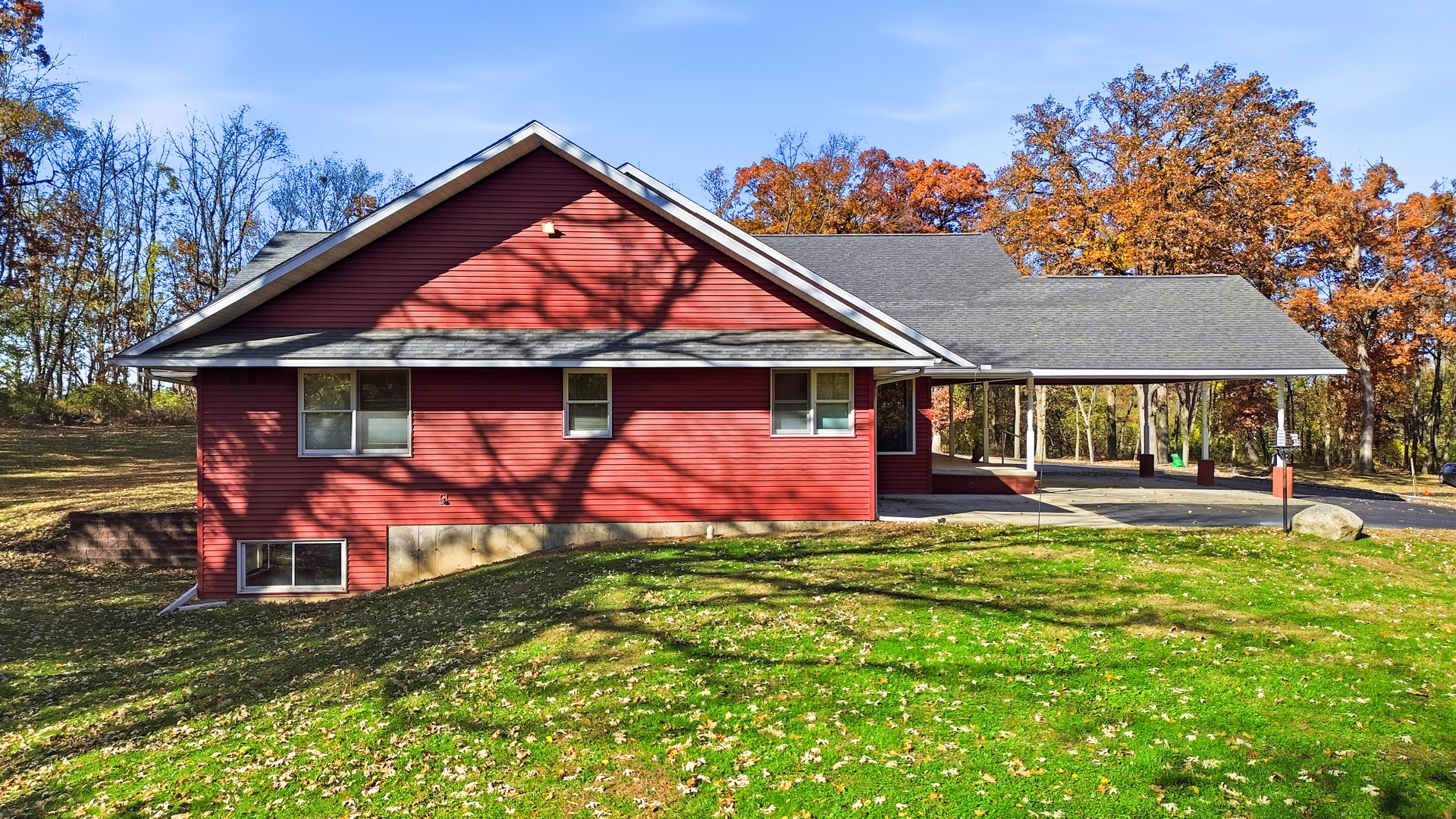 15207 Henry Road Morrison, IL 61270 - Photo 29 of 46 a view of swimming pool with a table and chairs under an umbrella