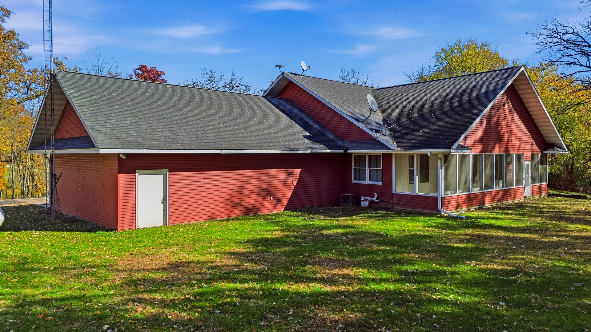 15207 Henry Road Morrison, IL 61270 - Photo 32 of 46 a view of an house with backyard space and swimming pool