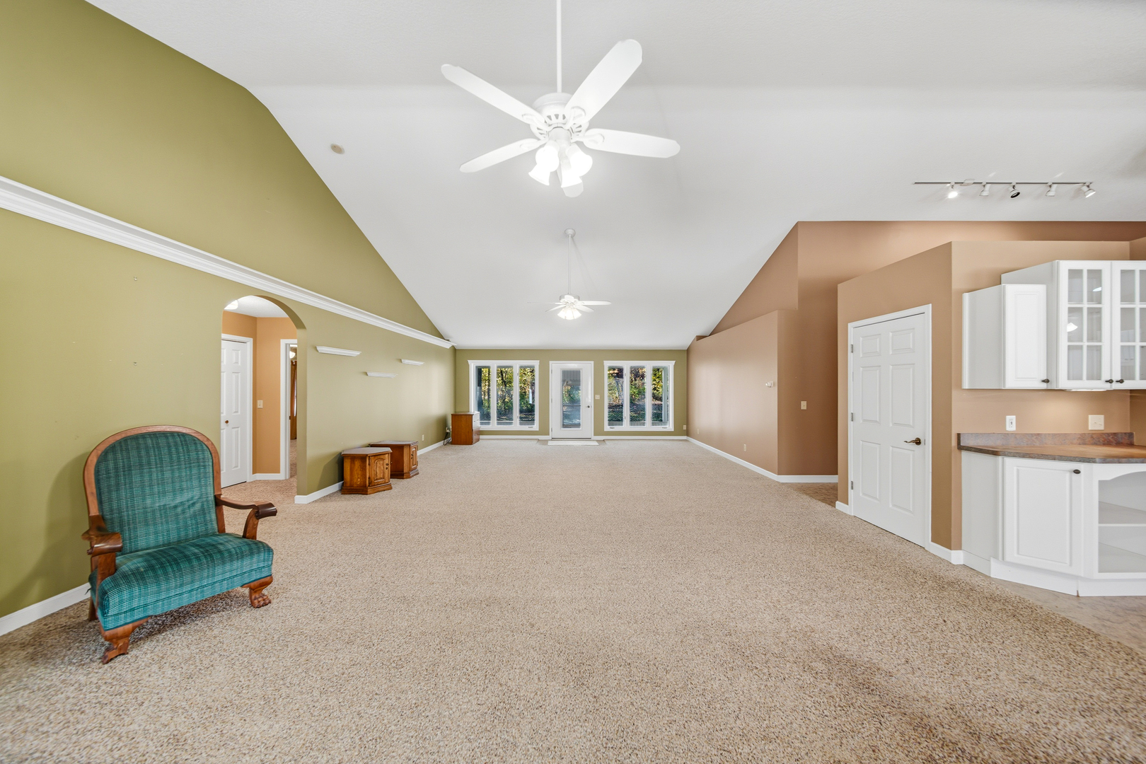 15207 Henry Road Morrison, IL 61270 - Photo 5 of 46 a bedroom with furniture and a chandelier