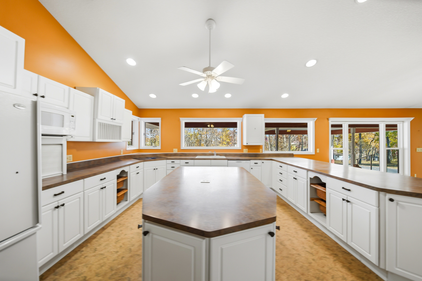 15207 Henry Road Morrison, IL 61270 - Photo 8 of 46 a kitchen with stainless steel appliances granite countertop a sink and cabinets