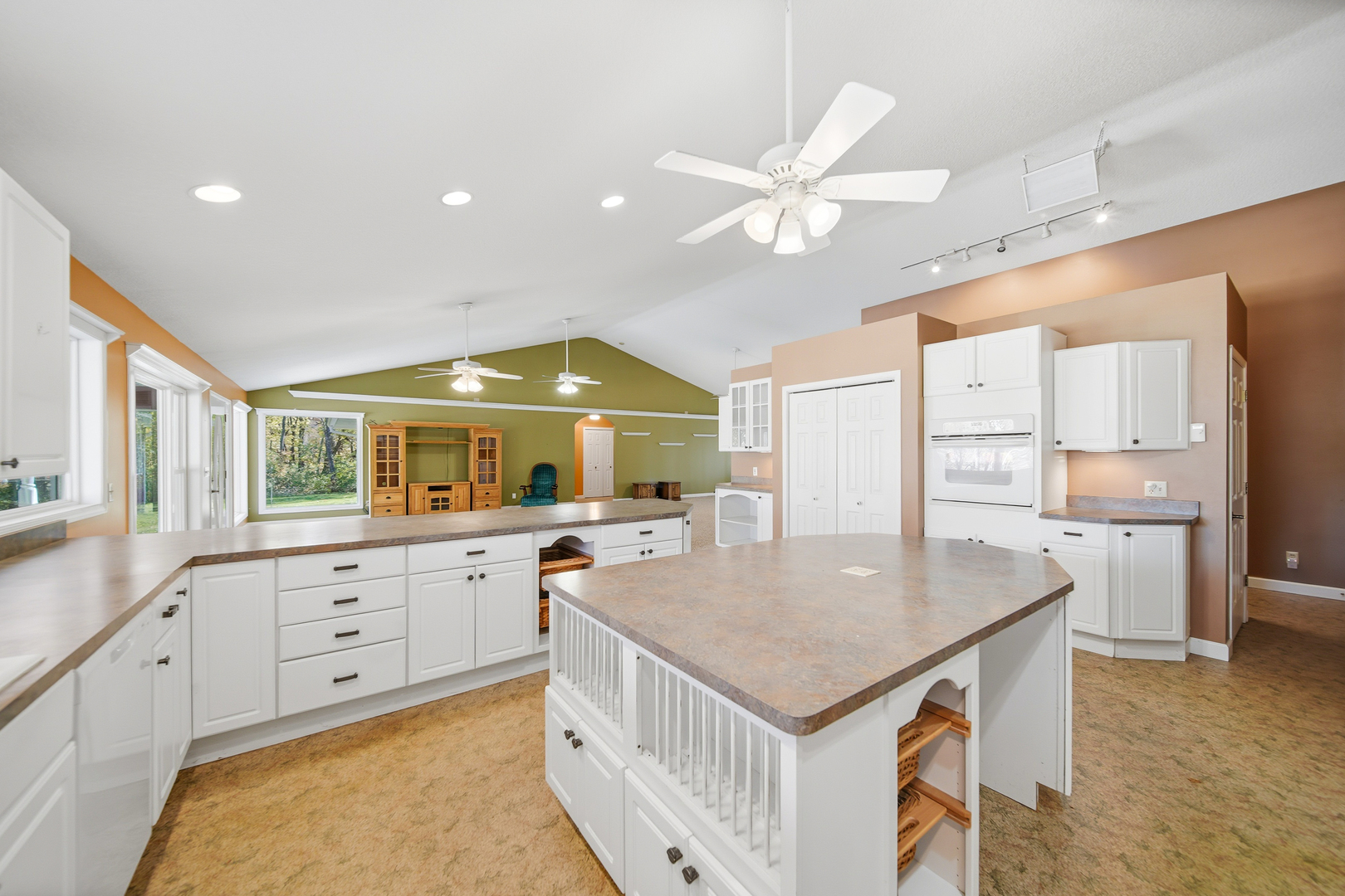 15207 Henry Road Morrison, IL 61270 - Photo 9 of 46 a kitchen with a stove a sink and a refrigerator