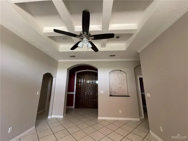 a view of a livingroom with a ceiling fan