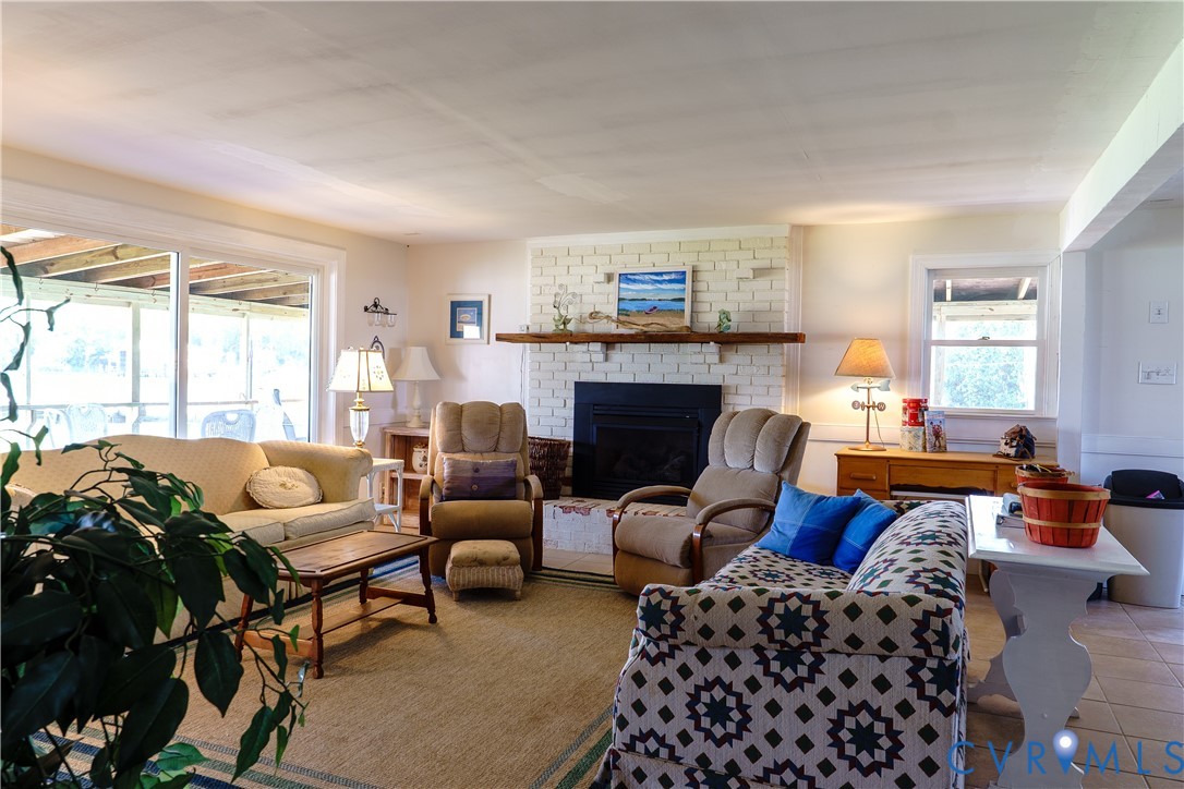 1280 Little Florida Road Farnham, VA 22460 - Photo 12 of 41 Living space featuring a white painted brick firep