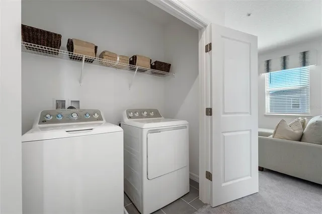 a utility room with dryer and washer