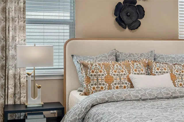 a view of a dining room with furniture and window
