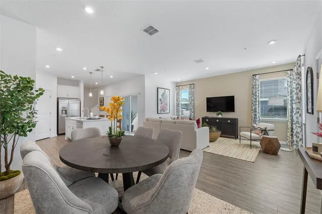 a view of a dining room with furniture