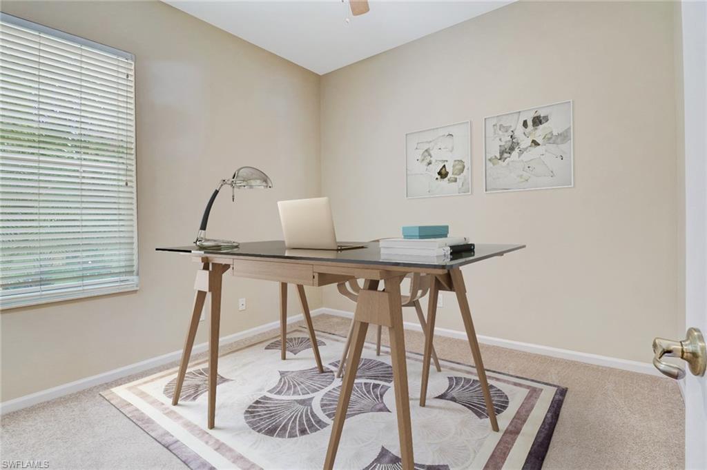 6564 Chestnut Circle Naples, FL 34109 - Photo 19 of 27 a dining room with table and chairs