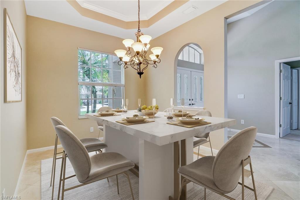 6564 Chestnut Circle Naples, FL 34109 - Photo 7 of 27 a view of a dining room with furniture window and outside view