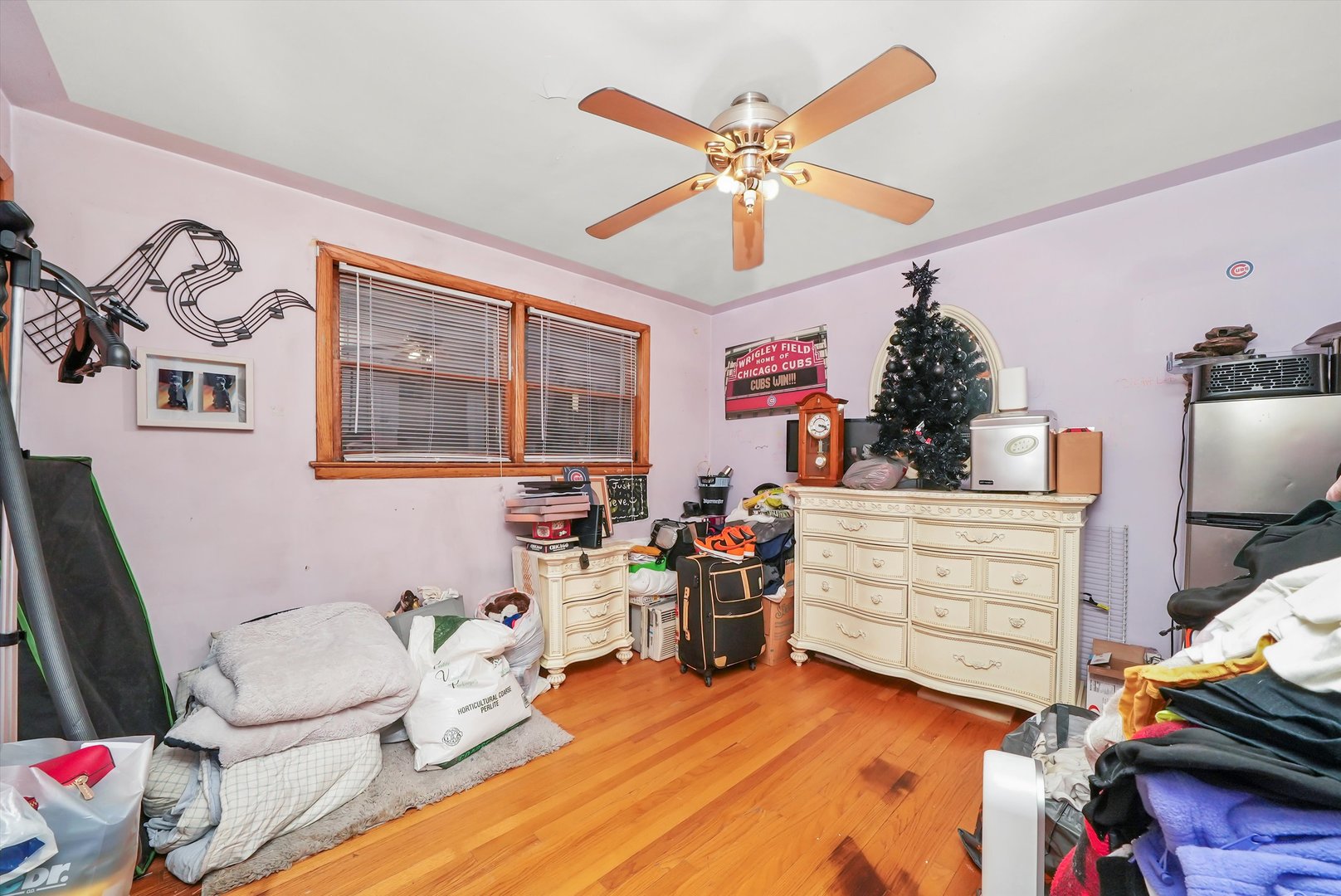 3543 West 57th Street Chicago, IL 60629 - Photo 14 of 43 a bedroom with furniture and a baby crib