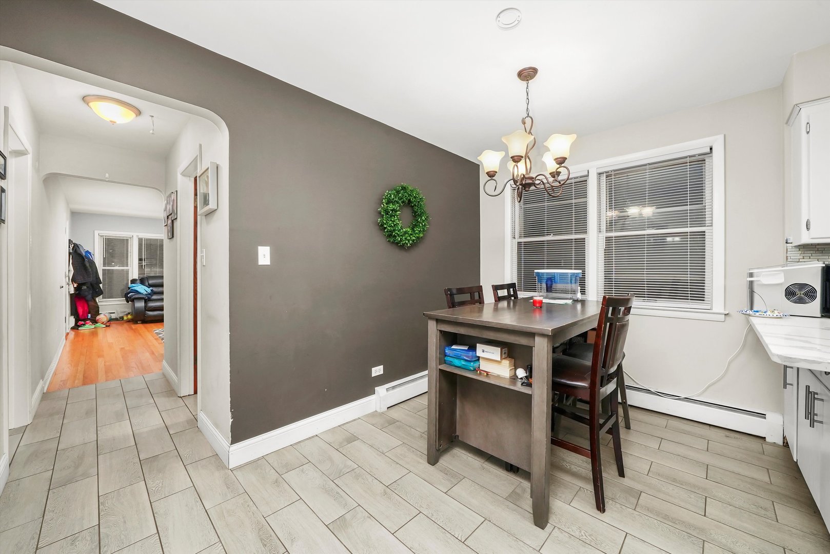 3543 West 57th Street Chicago, IL 60629 - Photo 24 of 43 a view of a dining room with a table and chairs