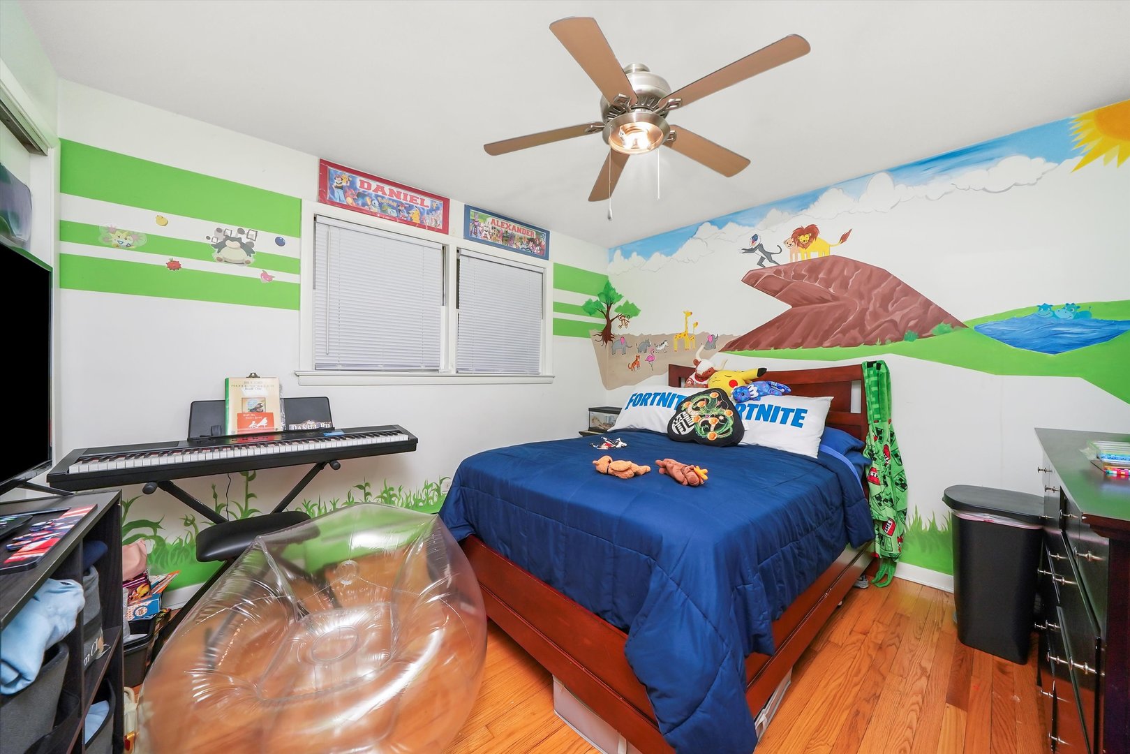 3543 West 57th Street Chicago, IL 60629 - Photo 26 of 43 a bedroom with a bed and a wooden floor