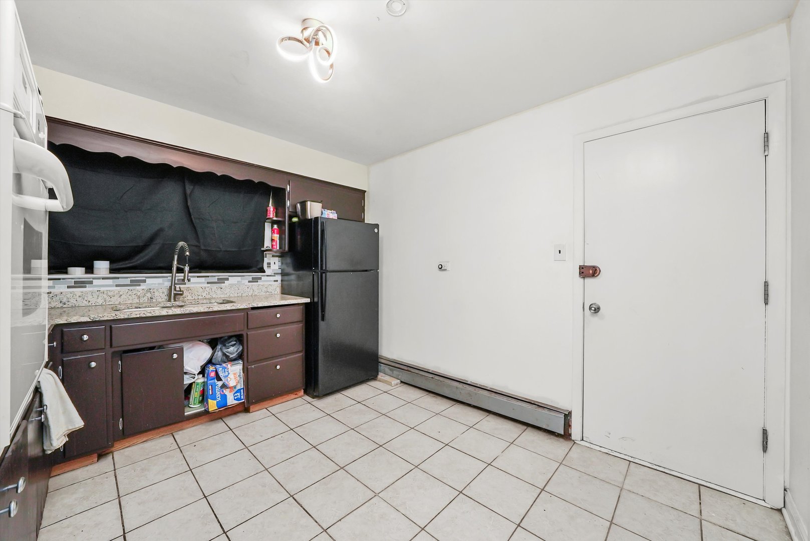 3543 West 57th Street Chicago, IL 60629 - Photo 34 of 43 a view of room with cabinets