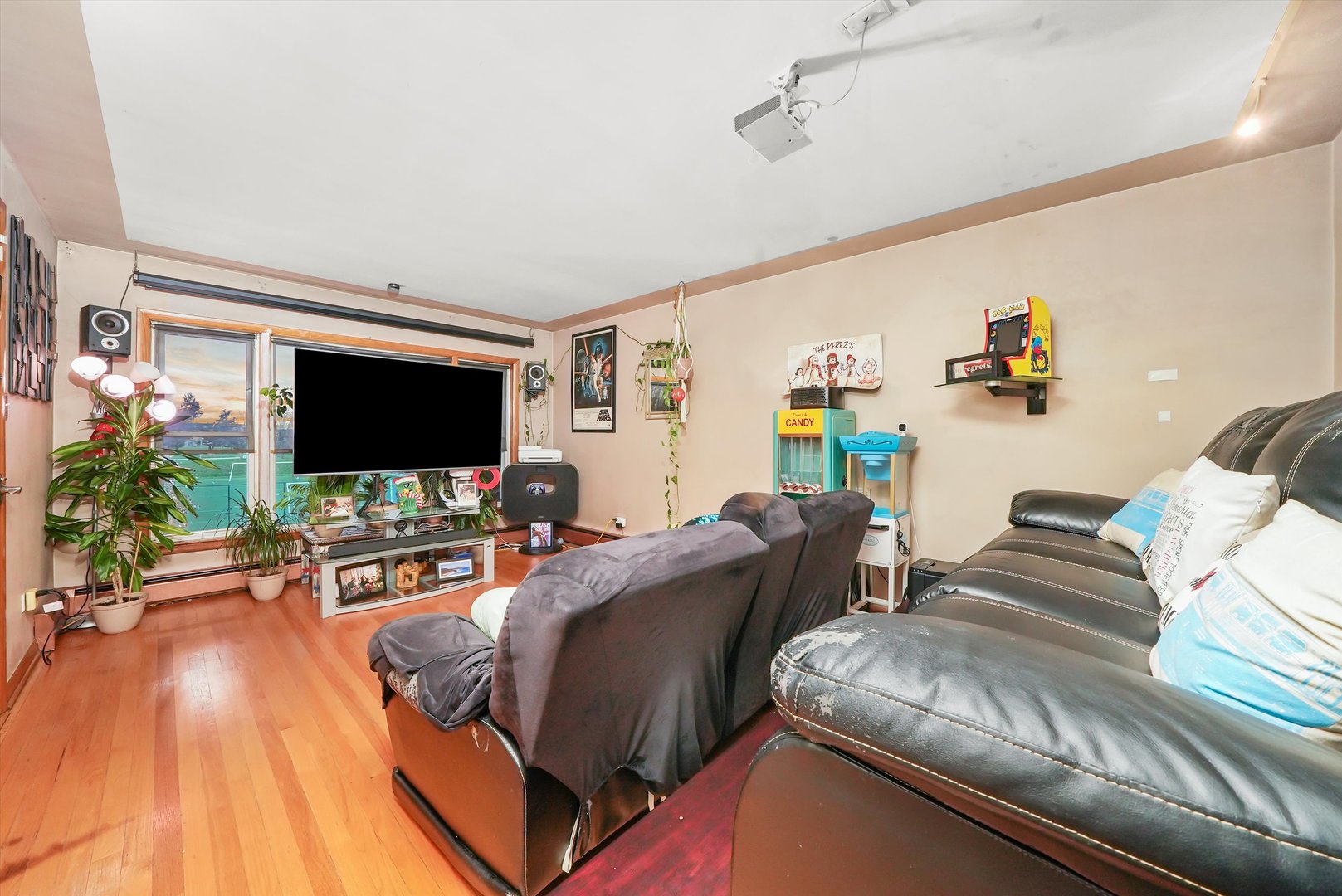 3543 West 57th Street Chicago, IL 60629 - Photo 6 of 43 a living room with furniture and a flat screen tv