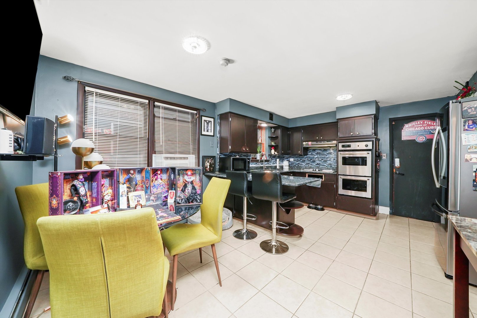 3543 West 57th Street Chicago, IL 60629 - Photo 7 of 43 a living room filled with furniture and a flat screen tv