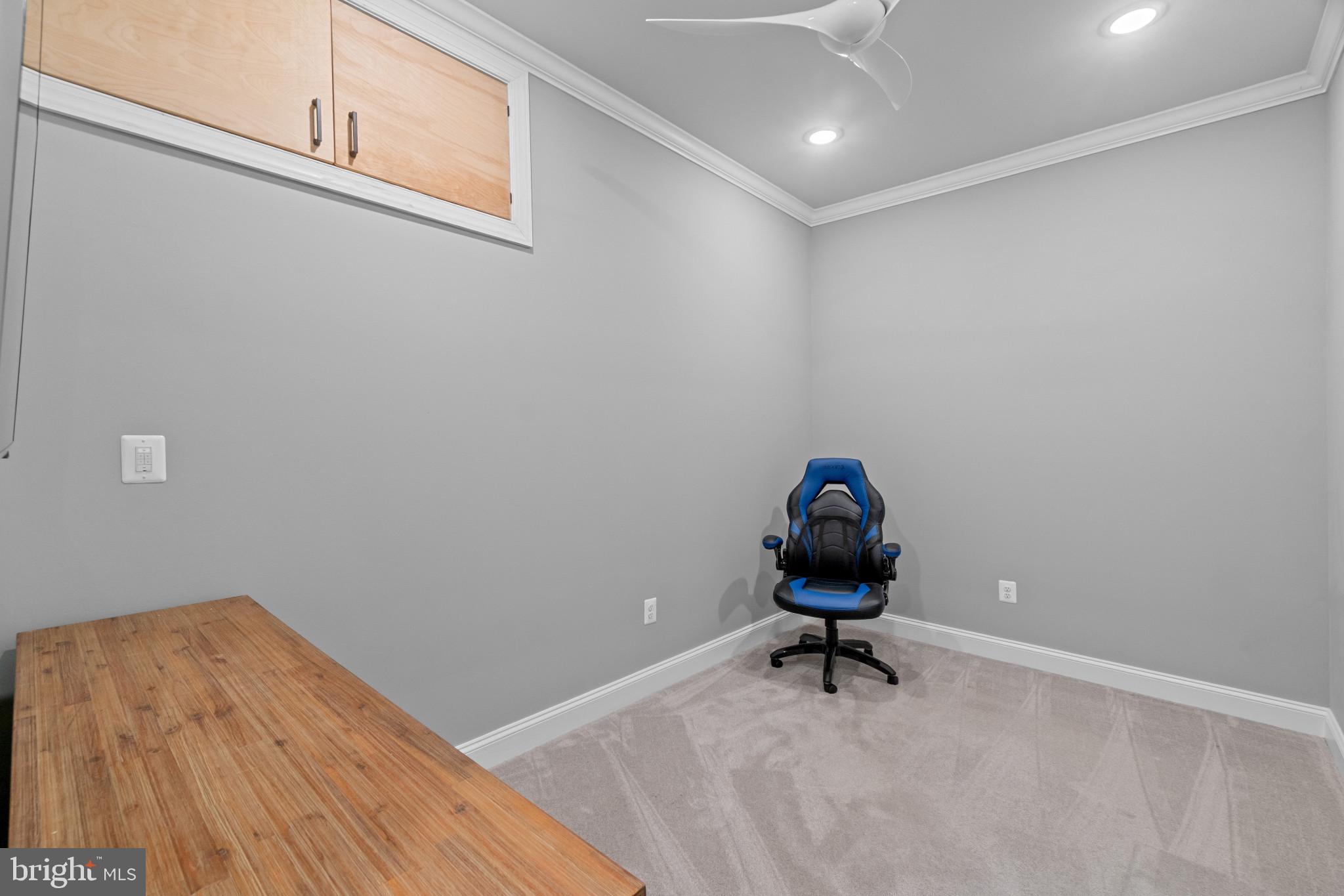 10907 Hollow Road Cockeysville, MD 21030 - Photo 39 of 57 a room with wooden floor and air hockey table