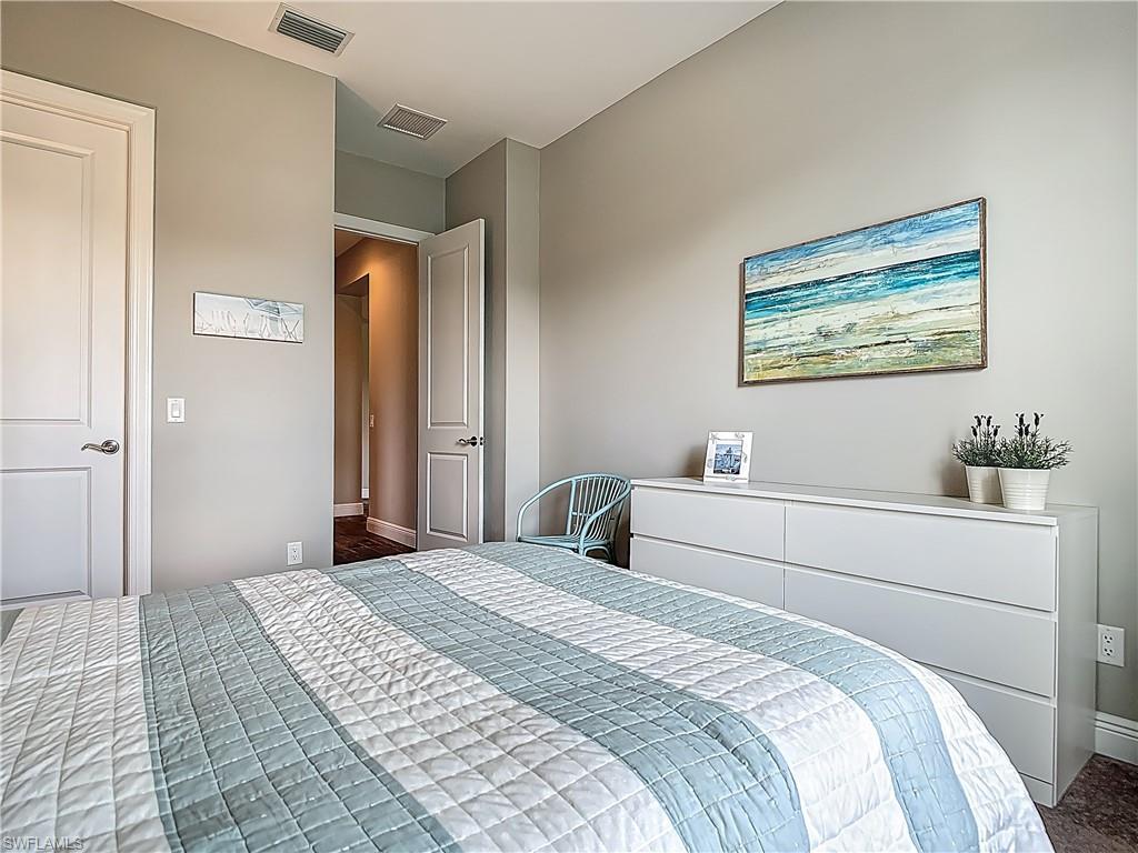 4524 Tamarind Way Naples, FL 34119 - Photo 23 of 50 Bedroom with baseboards