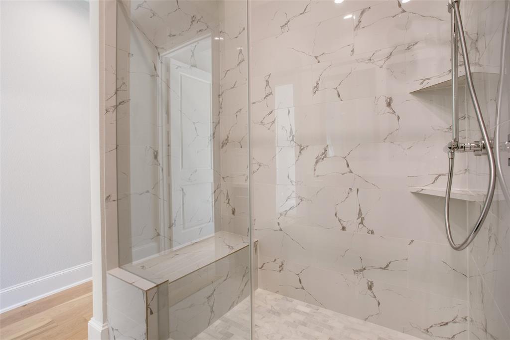 4639 New Water Lane Dallas, TX 75219 - Photo 11 of 20 a bathroom with a shower