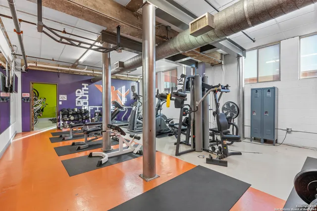 a view of a room with gym equipment