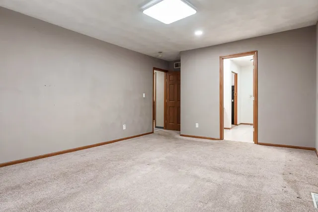 an empty room with an entryway