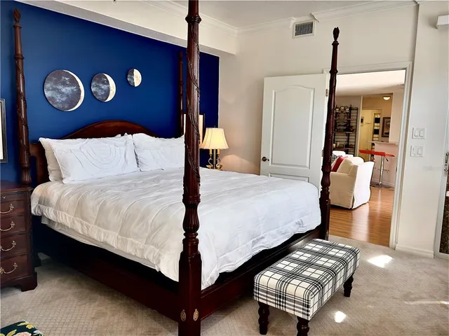 a bathroom with a window and a white door