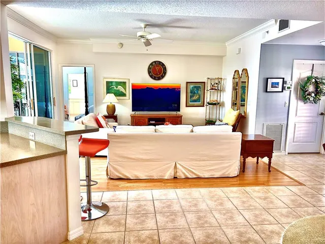 a kitchen with a sink a window and cabinets