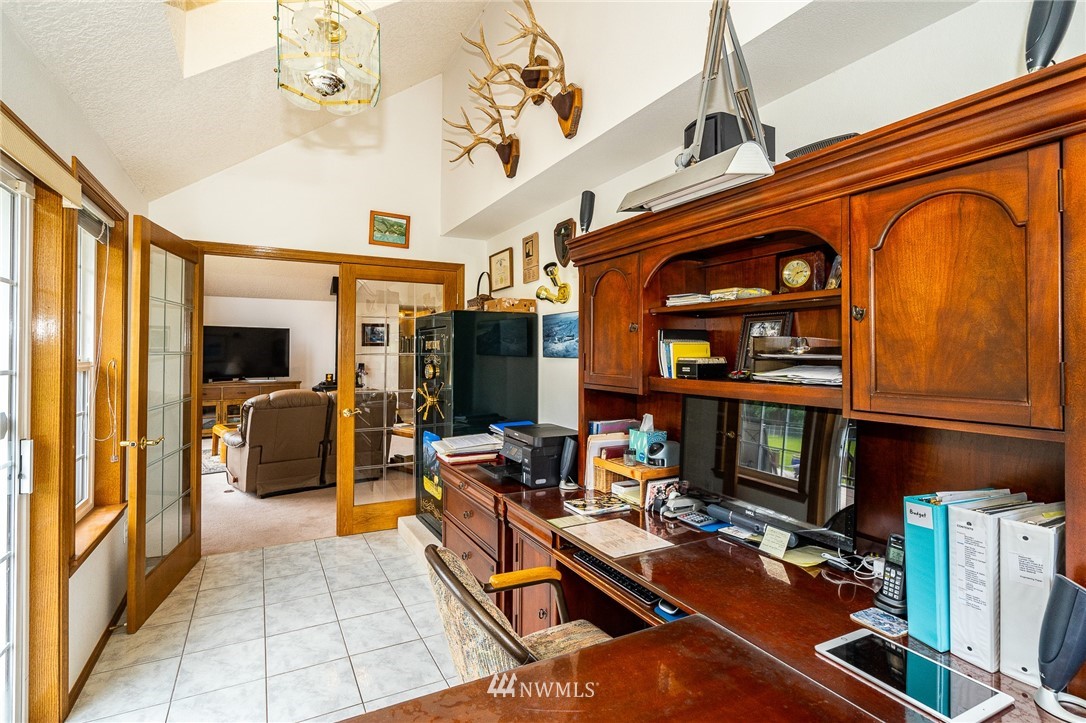 249 South Military Road Winlock, WA 98596 - Photo 13 of 33 a room with lots of furniture and a chandelier