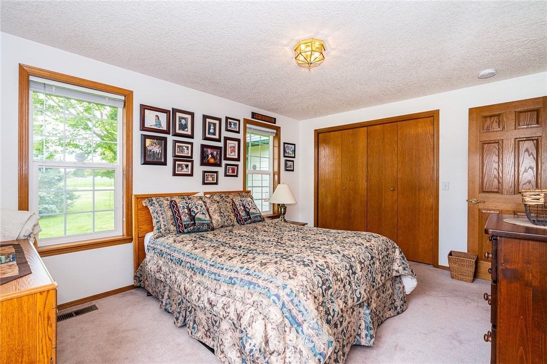 249 South Military Road Winlock, WA 98596 - Photo 17 of 33 a bedroom with a bed and a window