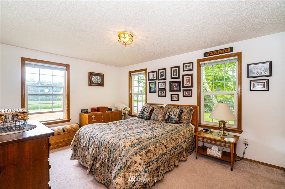 249 South Military Road Winlock, WA 98596 - Photo 18 of 33 a bedroom with a bed and a window