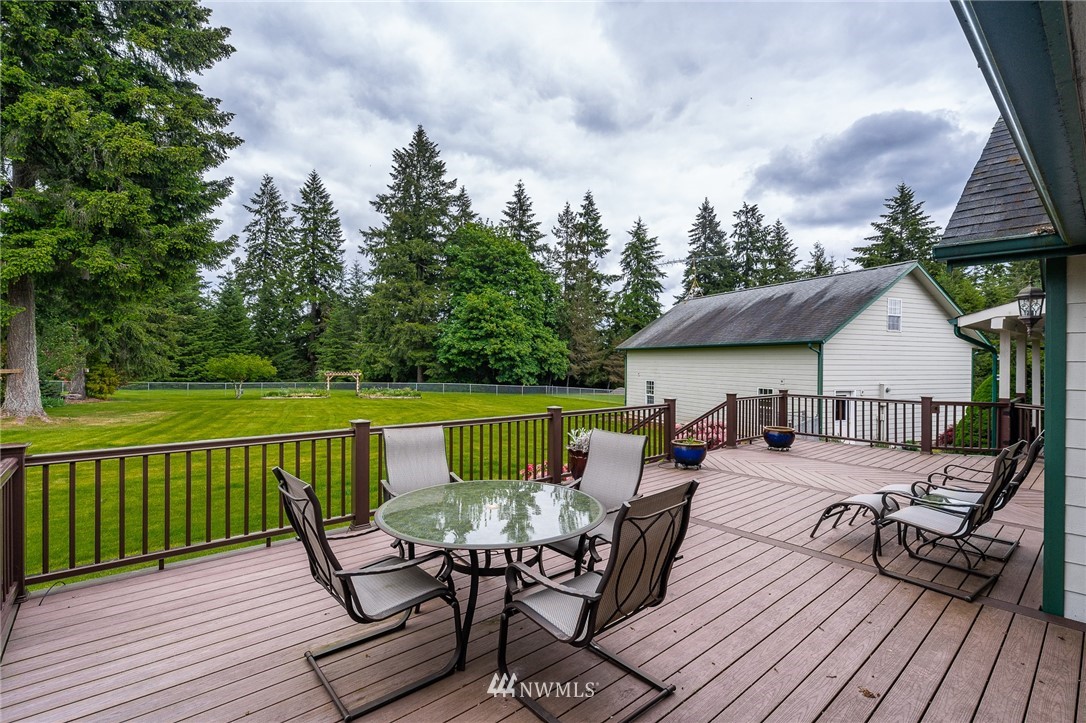 249 South Military Road Winlock, WA 98596 - Photo 24 of 33 a view of a roof deck with chair and wooden floor