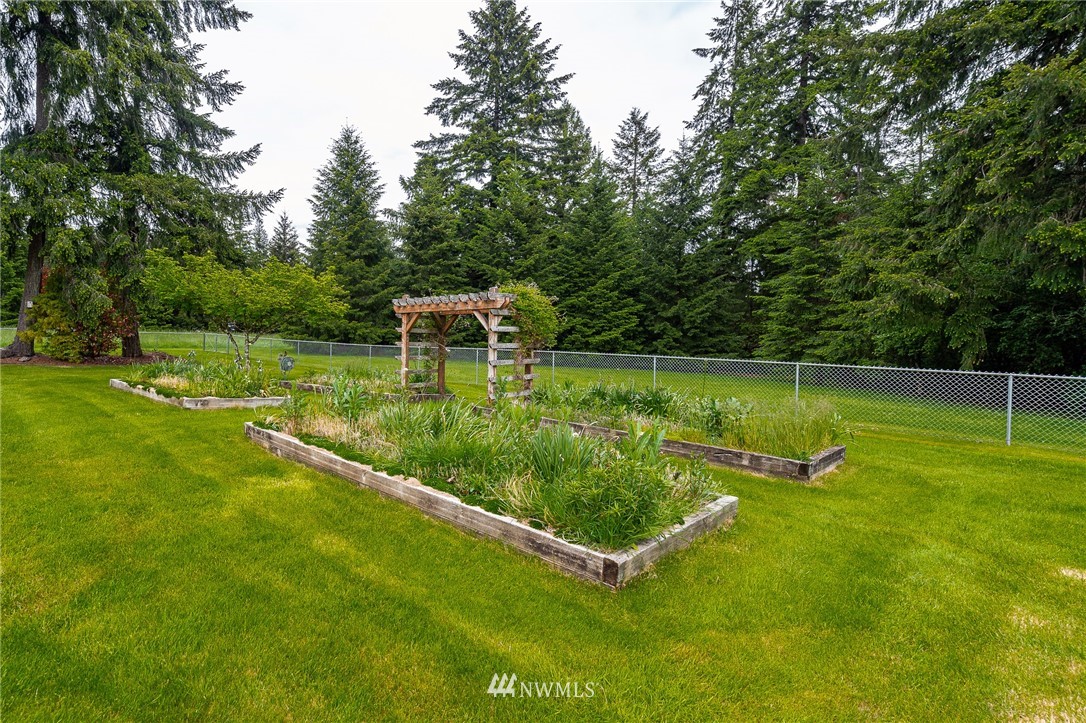 249 South Military Road Winlock, WA 98596 - Photo 25 of 33 a view of a backyard with a bench