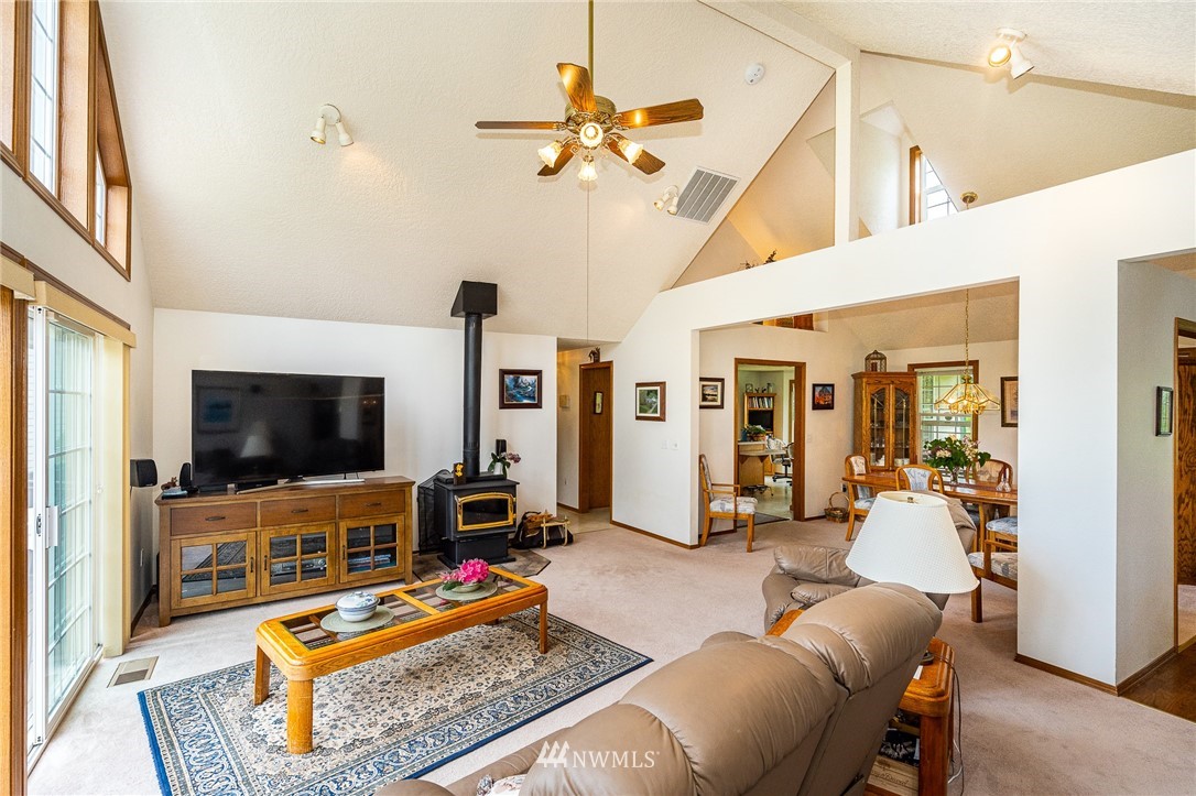 249 South Military Road Winlock, WA 98596 - Photo 7 of 33 a living room with furniture and a flat screen tv