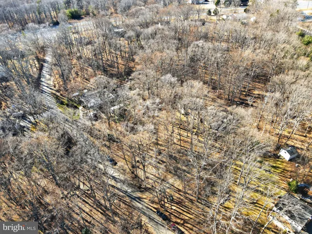 a view of a backyard of the house