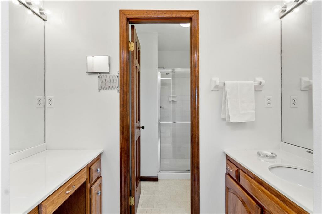 313 Knobs Hill Court Wexford, PA 15090 - Photo 19 of 25 a bathroom with a sink a toilet and shower