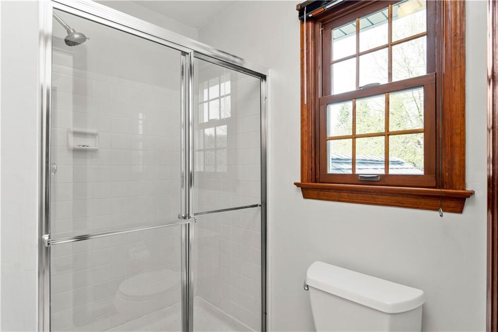 313 Knobs Hill Court Wexford, PA 15090 - Photo 20 of 25 a bathroom with a toilet and a shower