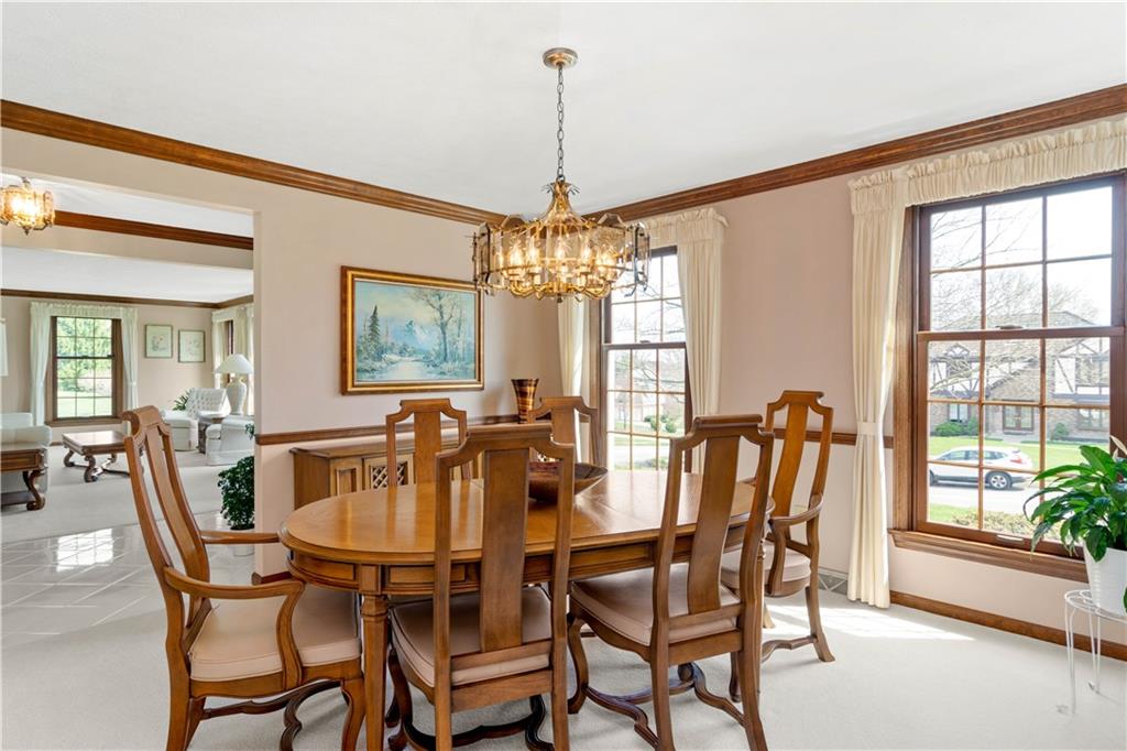 313 Knobs Hill Court Wexford, PA 15090 - Photo 6 of 25 a view of a dining room with furniture window and outside view