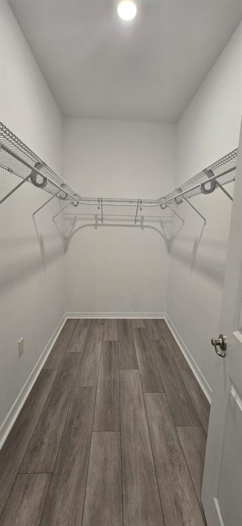 7193 Southwest 64th St Road Ocala, FL 34474 - Photo 12 of 17 a view of a room with racks on the wall