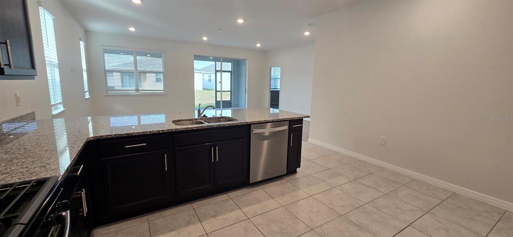 7193 Southwest 64th St Road Ocala, FL 34474 - Photo 3 of 17 a bathroom with a sink and a mirror
