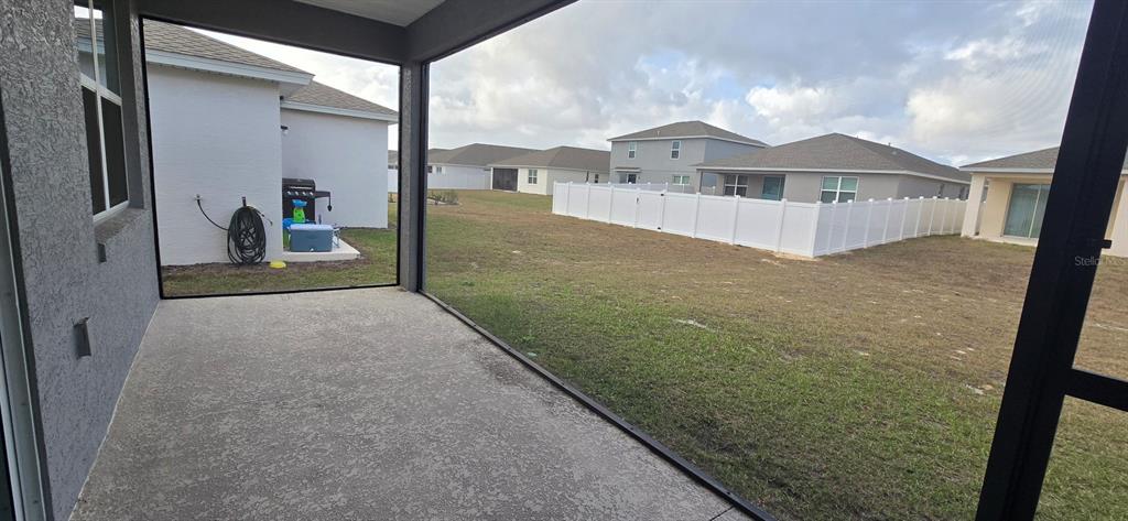 7193 Southwest 64th St Road Ocala, FL 34474 - Photo 8 of 17 a view of a house with a sink and a yard
