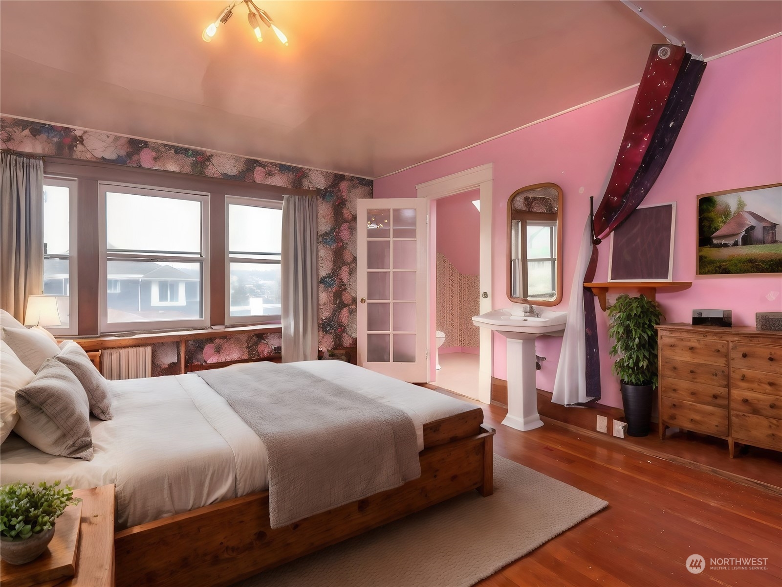 2208 Rucker Avenue Everett, WA 98201 - Photo 12 of 29 a bedroom with a bed dresser and a window