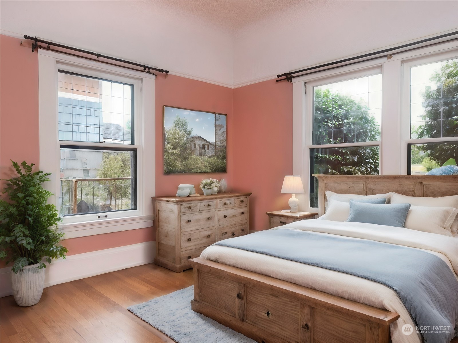 2208 Rucker Avenue Everett, WA 98201 - Photo 14 of 29 a bedroom with a bed and large windows