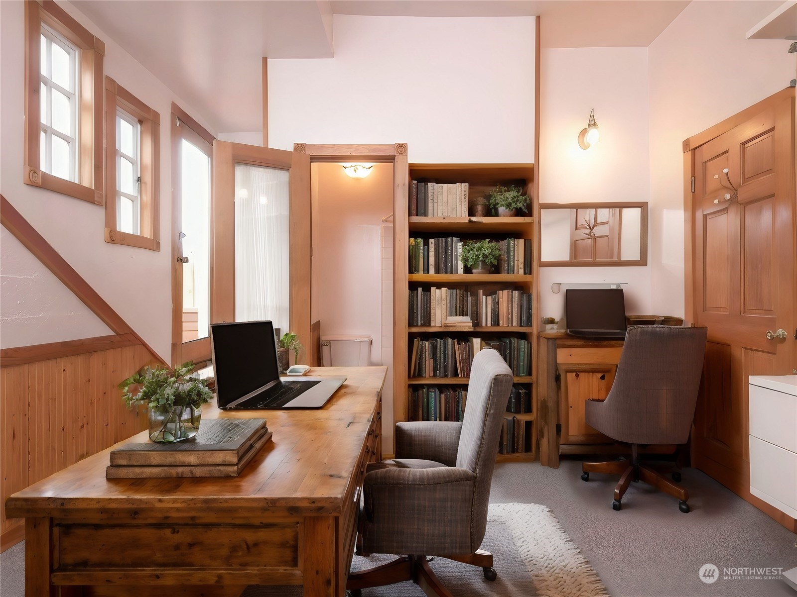 2208 Rucker Avenue Everett, WA 98201 - Photo 16 of 29 a view of a workspace with a bookshelf