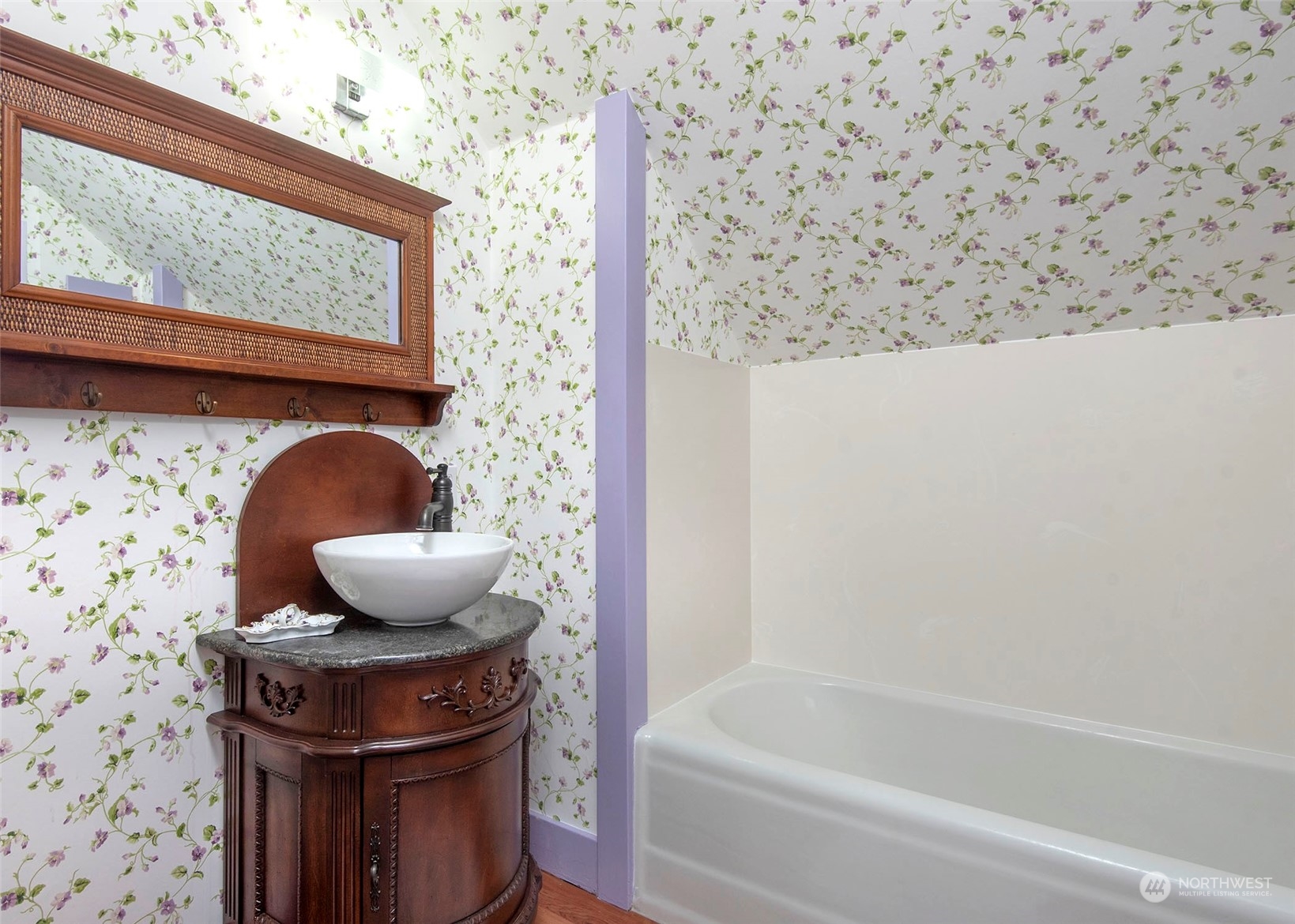 2208 Rucker Avenue Everett, WA 98201 - Photo 22 of 29 a bathroom with a toilet and a bathtub
